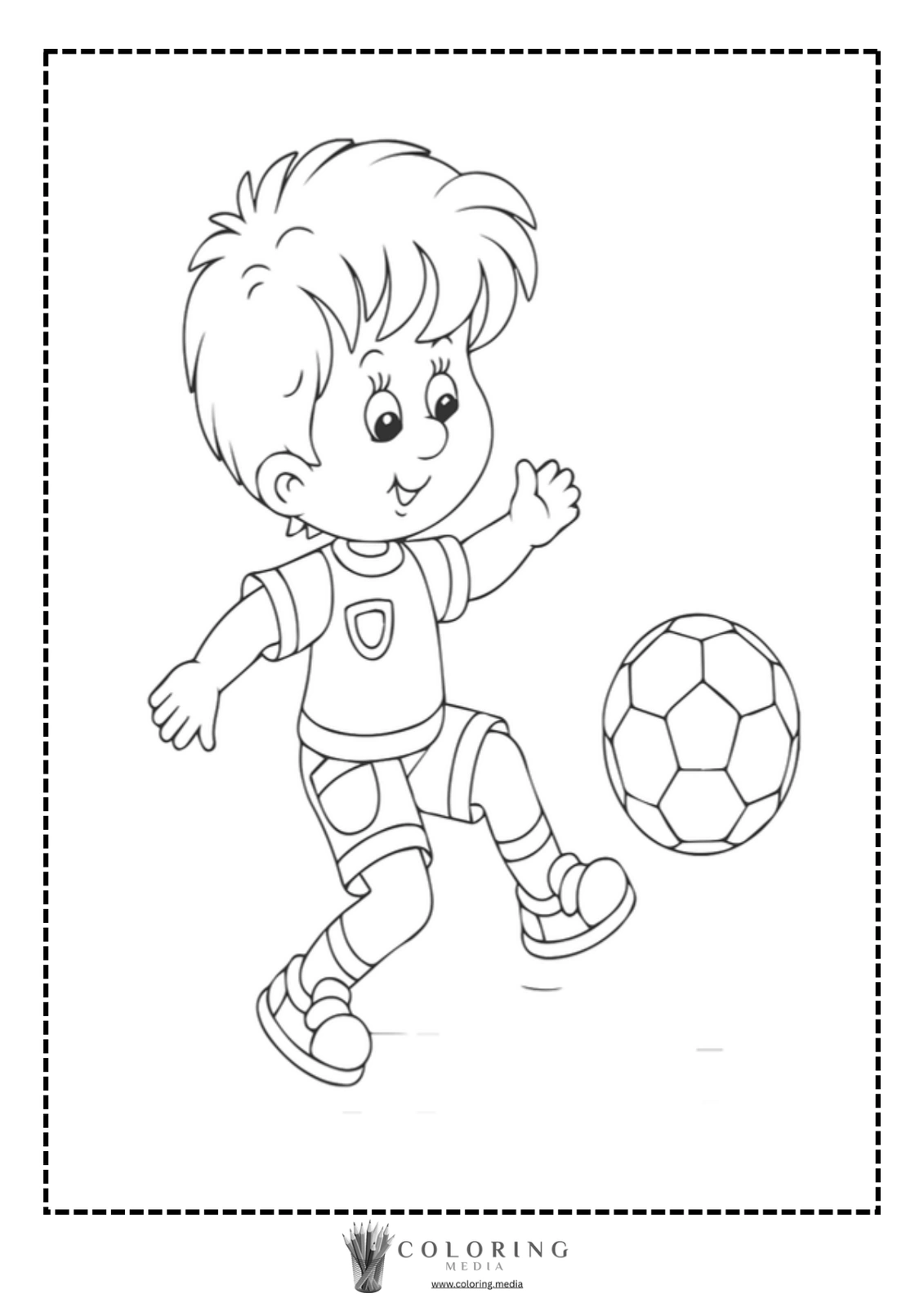 A cheerful child kicks a soccer ball while smiling.